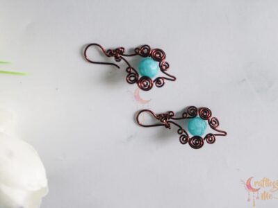 Swirls and bead drops earrings