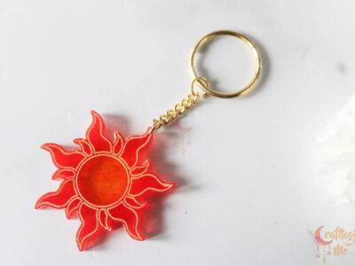 Sun keychain/magnet