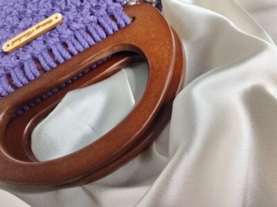 Purple handmade macramé bag with wooden handles